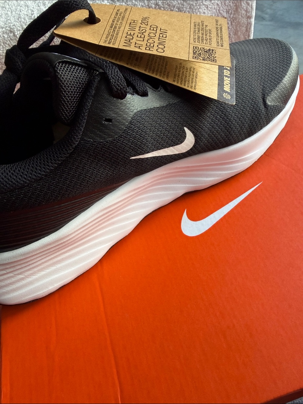 Nike Men’s Black Athletic Shoe with White Swoosh